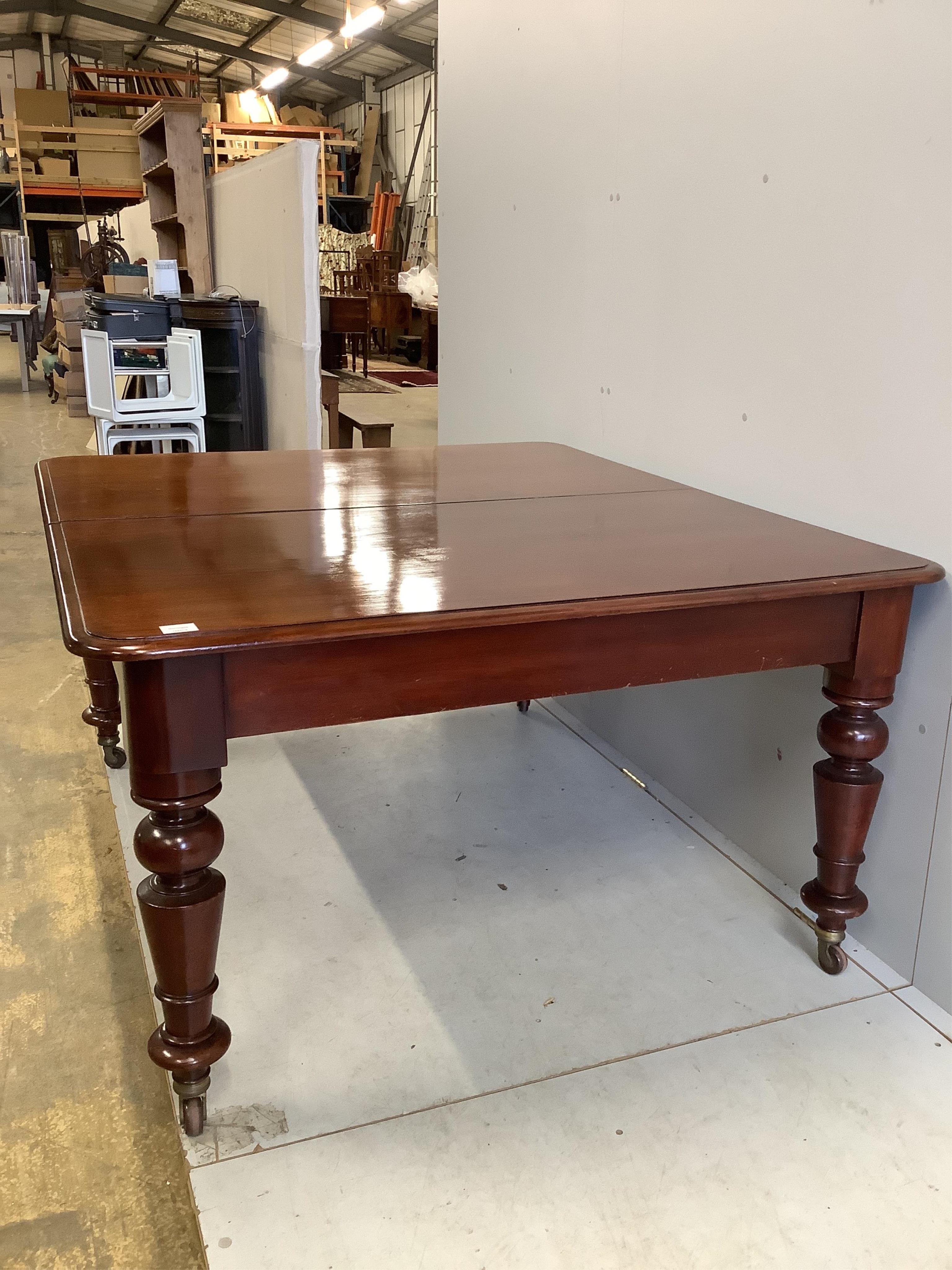 A Victorian rectangular mahogany extending dining table, 280cm extended, three spare leaves, depth 130cm, height 74cm. Condition - fair to good